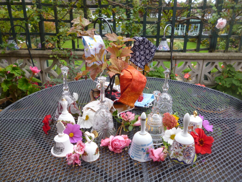 Bells, flowers & facemasks representing 2020