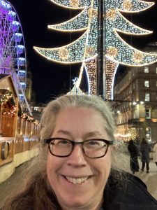 The Central Council president at George Square Glasgow with christmas lights