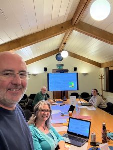 Jason and Andrea working through primary lessons plans at a meeting room in Southwark Cathedral