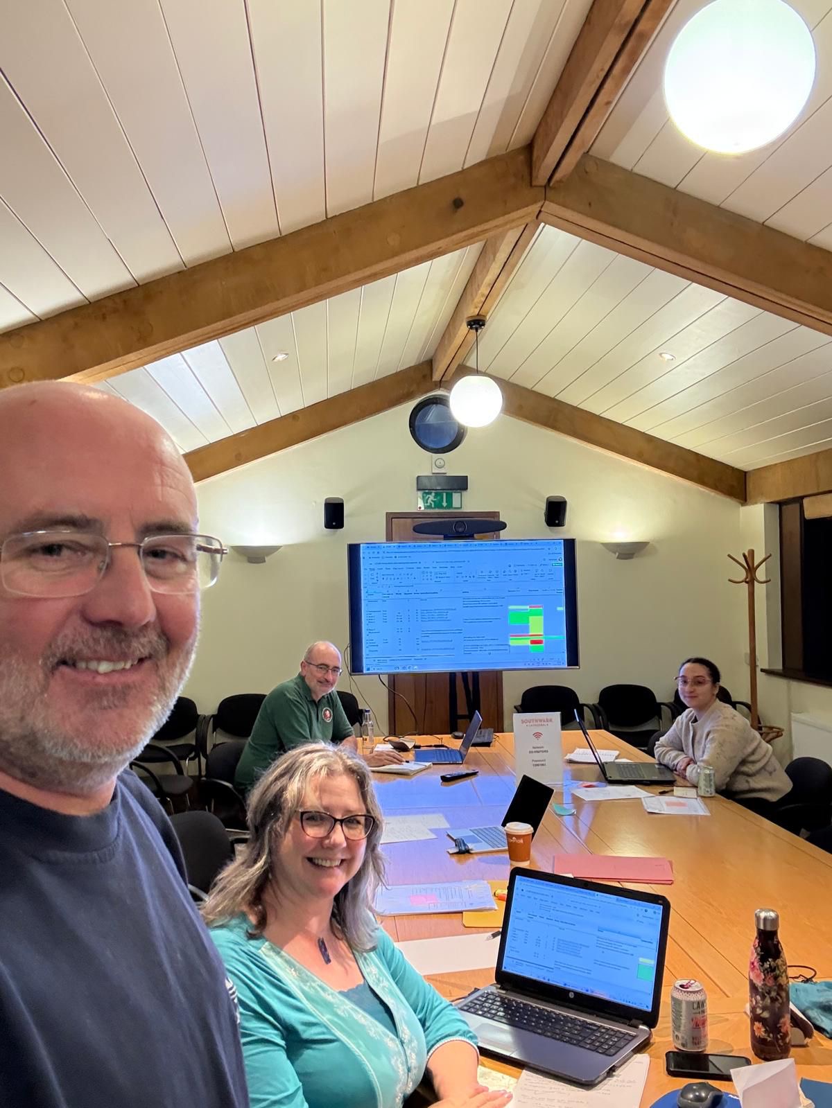 Jason and Andrea working through primary lessons plans at a meeting room in Southwark Cathedral