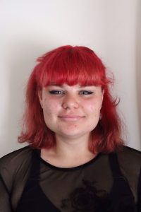 Josephine Leggett Youth Development Officer smiles into the camera with a headshot