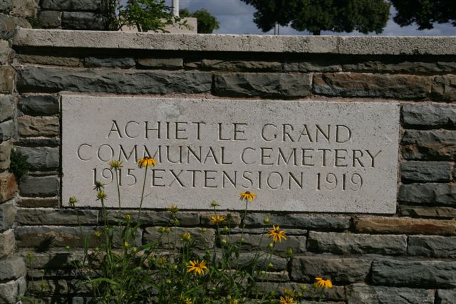 Name inscription on cemetery wall