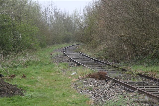 Disused railway adjacent to cemetery