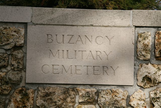 Name inscription on cemetery wall
