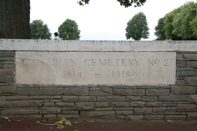 Name inscription panel on cemetery wall