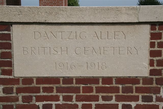 Name panel on cemetery wall