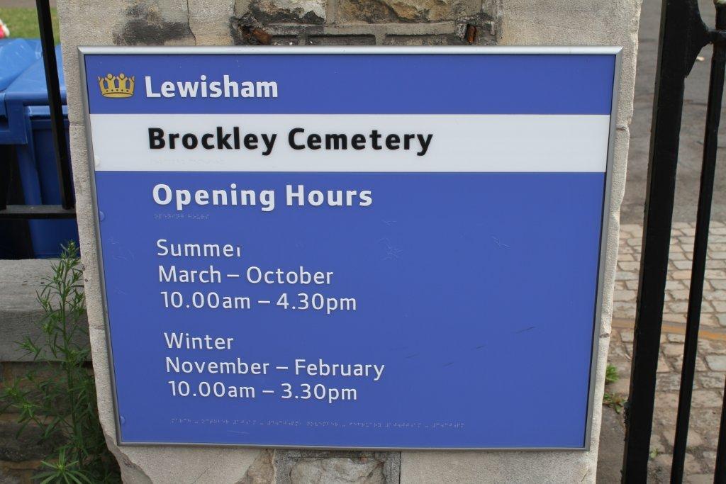 Cemetery opening times sign