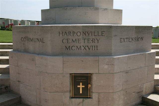 Name inscription at base of Cross