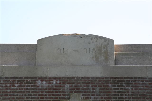 Dates inscribed over cemetery face of entrance archway